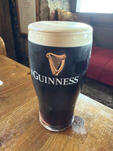 A full pint glass of Guinness at Smugglers Creek Inn Rossnowlagh restaurant