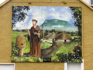 View of Saint’s painting outside the Corner Bar