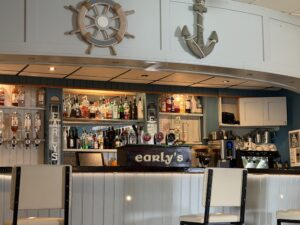 Early’s Bar in Arranmore, showcasing wooden bar, glassware, and taps