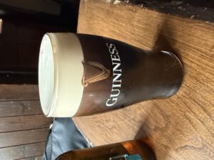 Guinness pint served at The Widow’s, Belturbet, with a large head in a traditional pub glass